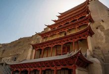 What time do the Mogao Grottoes open in the off-season? What
